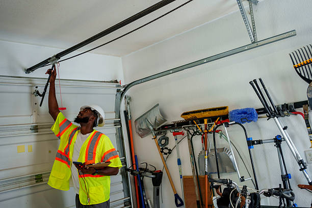 Professional Garage Door Roller Replacement technician working in Eveleth, MN